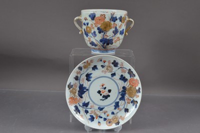 Lot 324 - A Japanese Edo Period Imari porcelain double handled cup and saucer of  large size