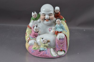 Lot 325 - A Chinese famille rose porcelain laughing buddha