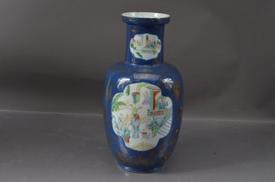 Lot 330 - A Chinese Qing Dynasty famille vert powder blue ground baluster vase