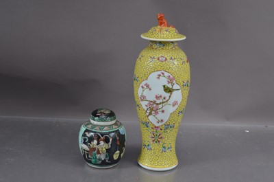 Lot 334 - A Chinese famille jaune vase and cover