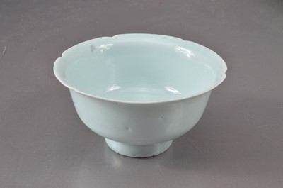 Lot 345 - A Chinese celadon glazed foliate rimmed dish