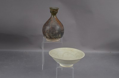 Lot 346 - A Sawankhalok incised celadon bowl (Thai c14th Century)