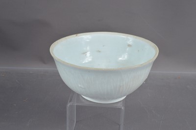 Lot 347 - A Chinese Southern Song Dynasty qingbai incised lotus bowl