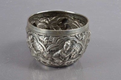 Lot 362 - A small Burmese repoussé metalwork 'thabeik' bowl