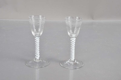 Lot 388 - A pair of 18th Century Georgian opaque twist cordial glasses