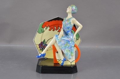 Lot 448 - A limited edition "Tea With Clarice Cliff" figurine