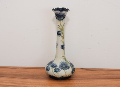 Lot 480 - A restored James McIntyre & Co Florian Ware pottery vase