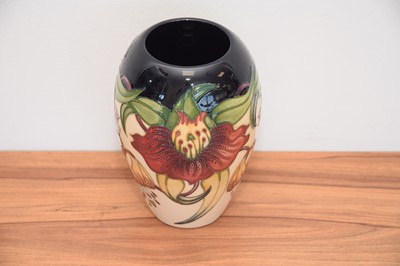 Lot 499 - A modern Moorcroft Pottery orchid pattern vase