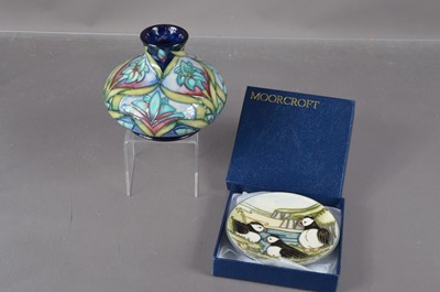 Lot 514 - A modern Moorcroft Pottery 'Cleopatra' vase and a 'Puffin' pin tray dish