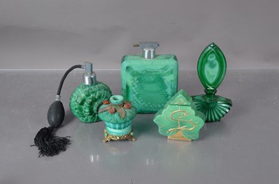 Lot 529 - A collection of malachite style perfume bottles