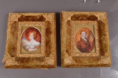 Lot 576 - A pair of George IV miniature portraits of a lady and gentleman