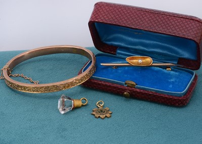 Lot 15 - A small collection of gold and gilt metal jewels