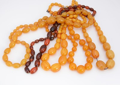 Lot 58 - Five 'Simulated' Amber Resin necklaces