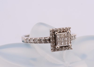 Lot 86 - An 18ct white gold diamond multi set dress ring