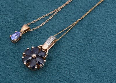 Lot 98 - A sapphire and diamond drop pendant on a fine chain in 9ct gold