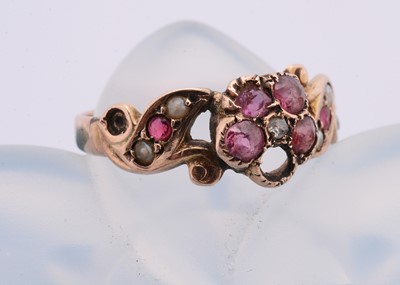 Lot 105 - A Victorian garnet and diamond seed pearl set posey ring