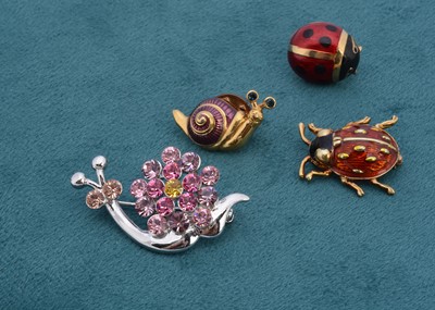 Lot 132 - A continental 14k gold and enamel ladybird brooch