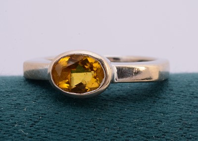 Lot 139 - A continental white gold and Citrine dress ring