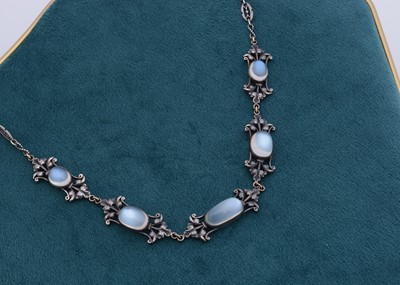 Lot 159 - An arts and crafts silver and moonstone fringe necklace