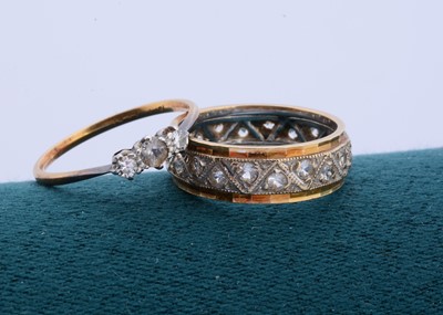 Lot 164 - An 18ct gold diamond and paste set three stone dress ring