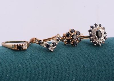 Lot 215 - Four 9ct gold rings