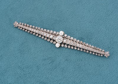 Lot 228 - A late 19th Century diamond navette shaped bar brooch