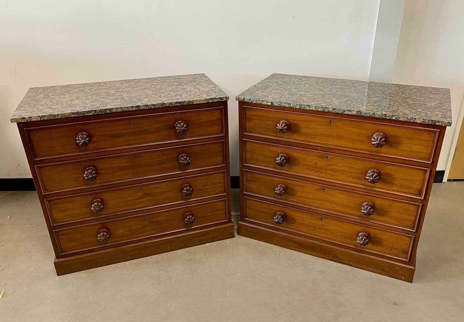 Lot 379 - A pair of Victorian and later mahogany and marble topped chests of drawers