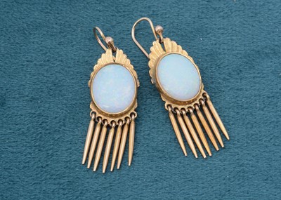 Lot 258 - A pair of yellow metal and precious opal drop earrings