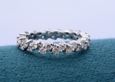 Lot 263 - A diamond white gold full eternity ring