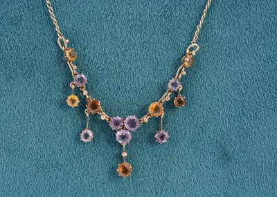 Lot 291 - A 9ct gold amethyst and Citrine fringe style necklace