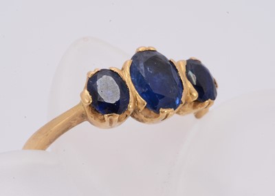 Lot 293 - A continental three stone sapphire dress ring