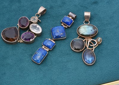 Lot 299 - Three hardstone silver set pendants