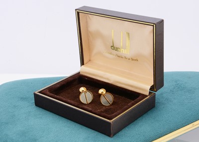 Lot 300 - A pair of Alfred Dunhill gilt metal and steel cufflinks