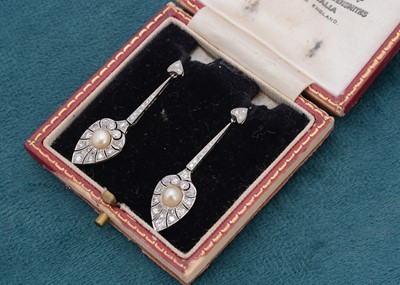 Lot 314 - A pair of diamond, pearl and platinum art deco drop earrings