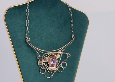 Lot 319 - A contemporary silver and amethyst pendant on chain