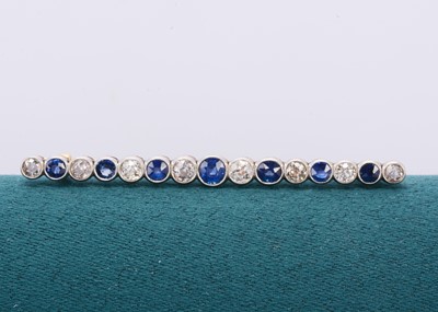 Lot 342 - An Edwardian high carat gold and platinum set sapphire and diamond bar brooch