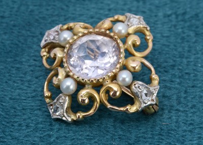 Lot 366 - A two colour gold sapphire, diamond and pearl quatrefoil brooch