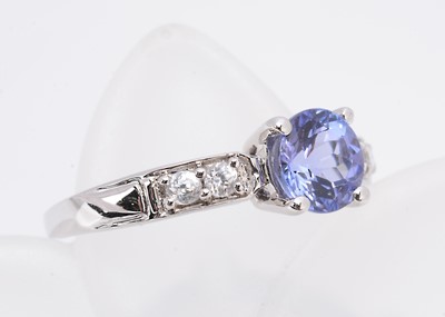 Lot 368 - A 9ct white gold tanzanite and zircon dress ring