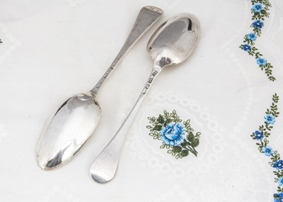 Lot 403 - Two silver George II silver serving spoons