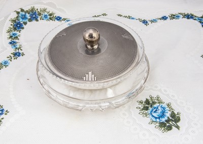 Lot 405 - A circular cut glass silver lidded dressing table pot