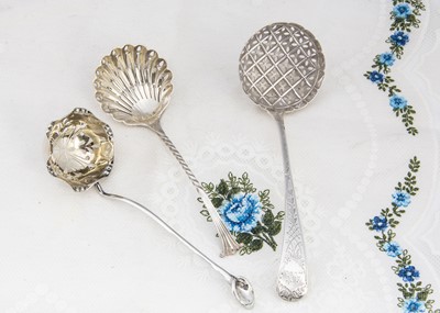 Lot 414 - Three silver sifter spoons