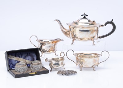 Lot 466 - A George V silver small sauce boat and a silver nurse's belt buckle