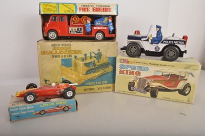 Lot 438 - Large scale tin and plastic Battery operated and Friction Drive Vehicles by Taiyo Marx and other makers (5)