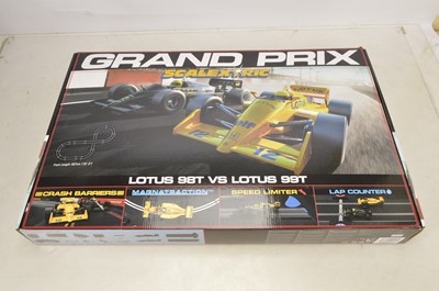 Lot 447 - Scalextric Grand Prix Lotus 89 vrs Lotus 99 Set and two additional Cars including James Bond Lotus Esprit and Knight Rider (3)