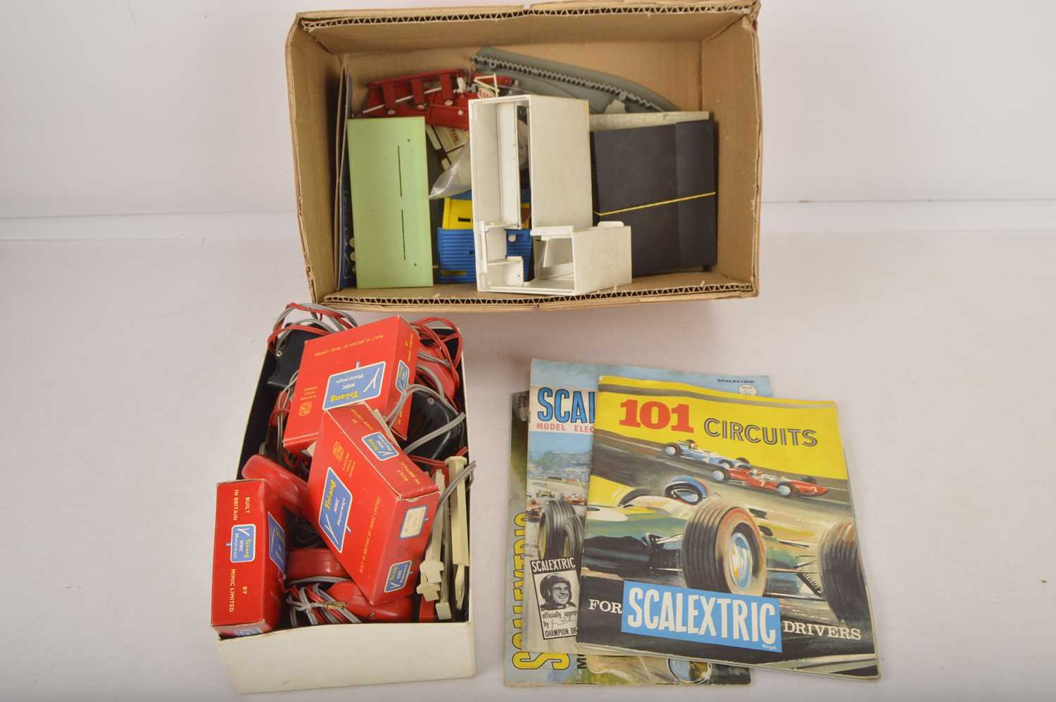 Lot 452 - Tri-ang Minic Motorway Buildings and large collection of Track and two Scalextric Catalogues (qty)