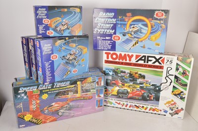 Lot 454 - Playtime Radio Control Stunt car system Accessories and TOMY afx F1 Slot Car Set (8)