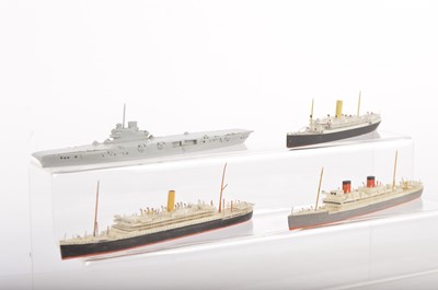 Lot 493 - Wooden 1:1200 or similar Waterline Liners and metal Aircraft Carrier (4)