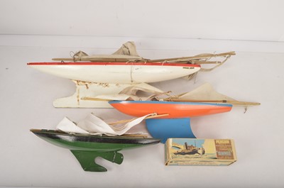 Lot 495 - Star and Tri-ang Pond Yachts and Penguin clockwork Tug (4)