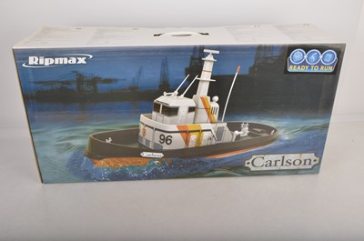 Lot 496 - Ripmax  unused Radio Control ships and AL Amsterdam Tug (3) 