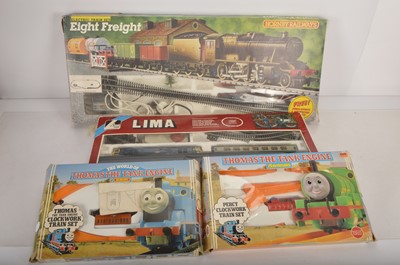 Lot 891 - Hornby Lima Electric and Clockwork 00 gauge sets including Thomas items in original boxes (4)